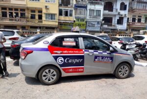 quang-cao-tren-xe-taxi-VIC